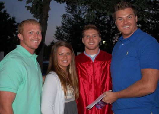 Drew Ann Reid with her brothers